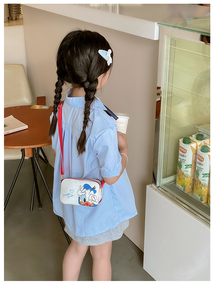 The 2025 new children's mobile phone bag is a trendy, fashionable, fresh, sweet, cartoonish, creative and simple single-shoulder crossbody bag for women undefined