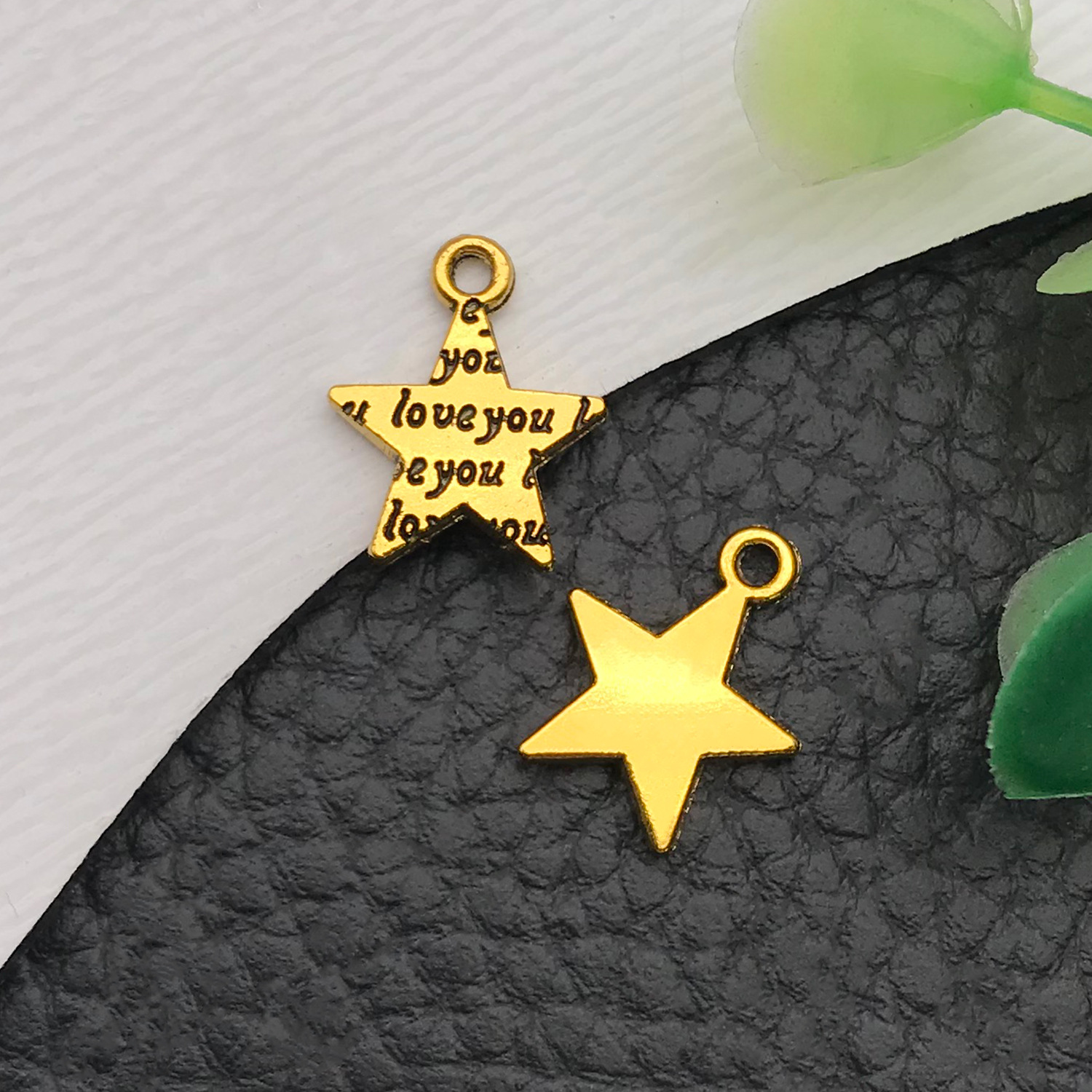 13573-古金锌合金小五角星星12x14-0.7g