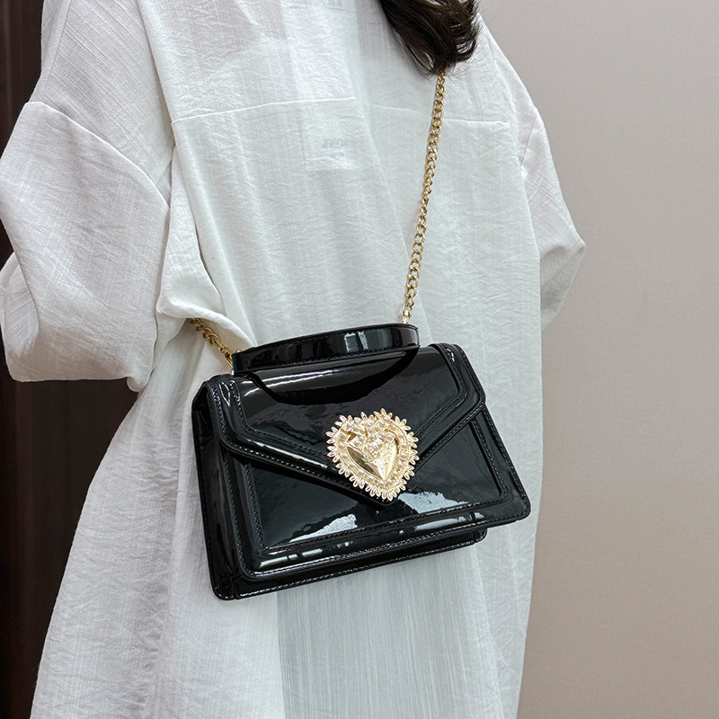 Bolso de cadena de textura transfronteriza 2025 nuevo bolso de amor bolso de hombro de sentido avanzado bolso de mensajero brillante de charol mujer