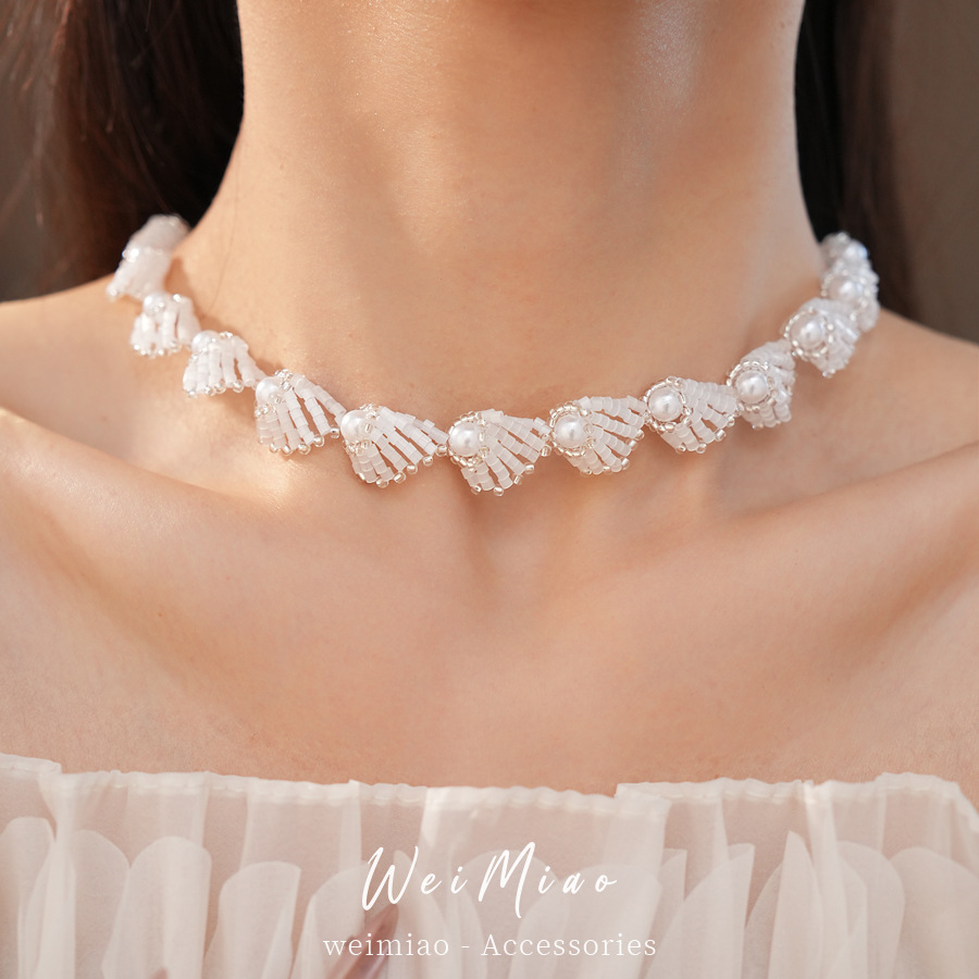 Temperamento retro collar de perlas de lujo ligero nicho de alta sensación de cadena de clavícula accesorios de vacaciones conjunto de joyería al por mayor