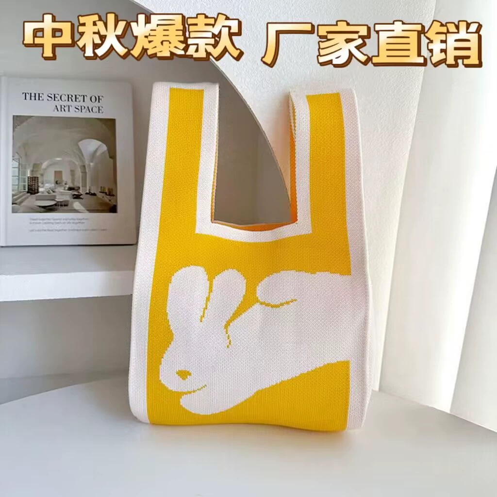 knitted shoulder bag, small handheld organizer purse, rabbit/kangaroo motif, lightweight