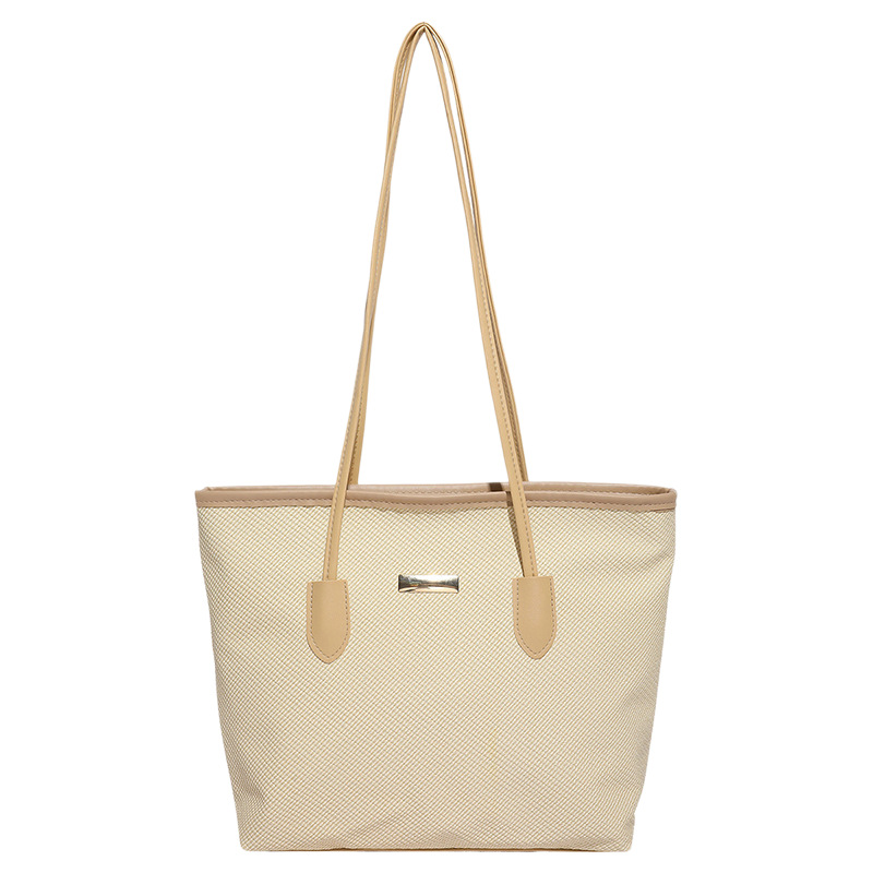 Moda francesa de alta calidad de moda textura bolso universal para mujeres otoño 2025 nueva gran capacidad de viaje bolsa
