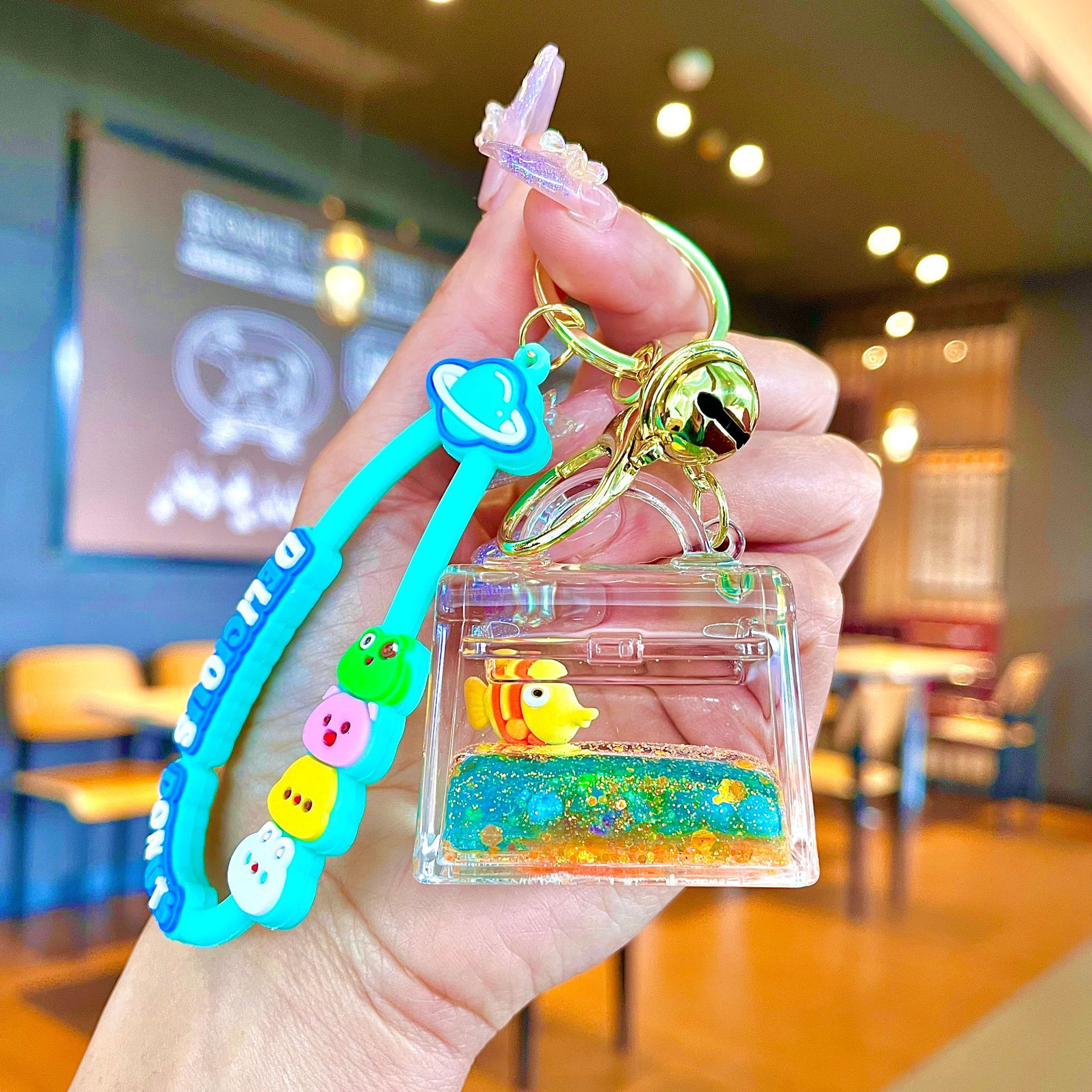 Nuevo llavero de dados luminosos con aceite, cuentas de burbujas, dados, colgantes de botella de arena de cristal, colgantes de bolsas al por mayor