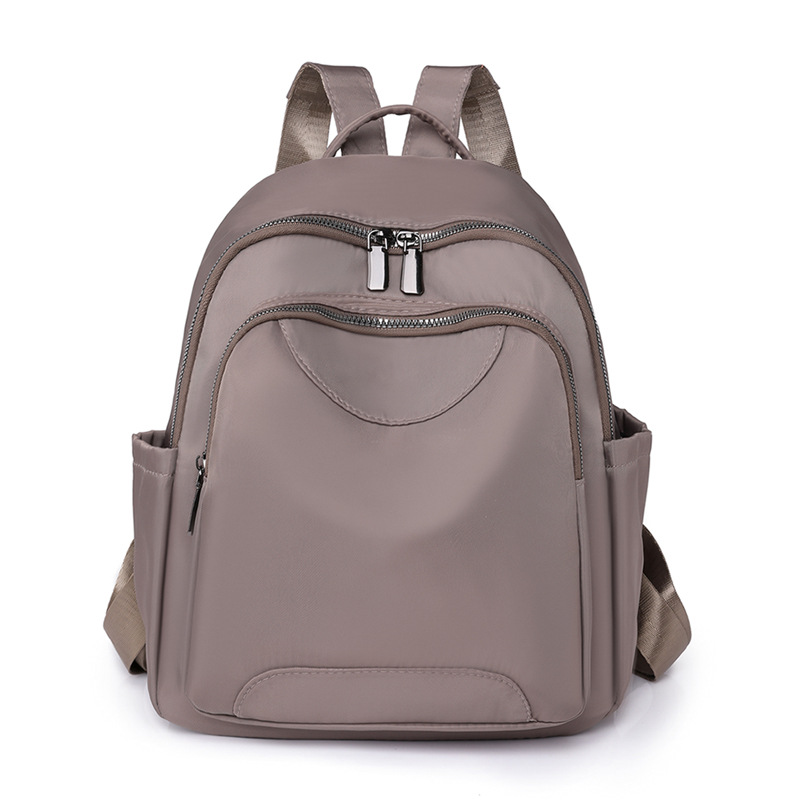 Fábrica al por mayor 2023 nueva mochila de nailon para mujer coreana simple mochila de viaje urbano mochila escolar de moda