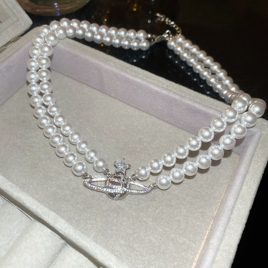 Collar con diseño de mariposa y flor, diseño de nicho moderno, cadena para clavícula, versátil, sensación de alta gama, fabricante de joyería para mejores amigas