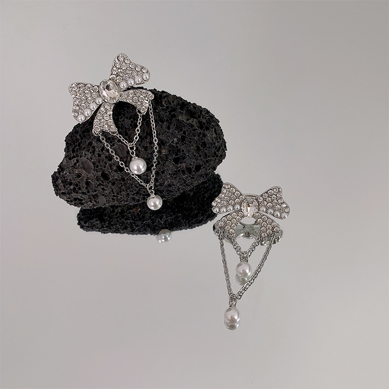 Small design fashionable elegant earrings with bow pearl with…