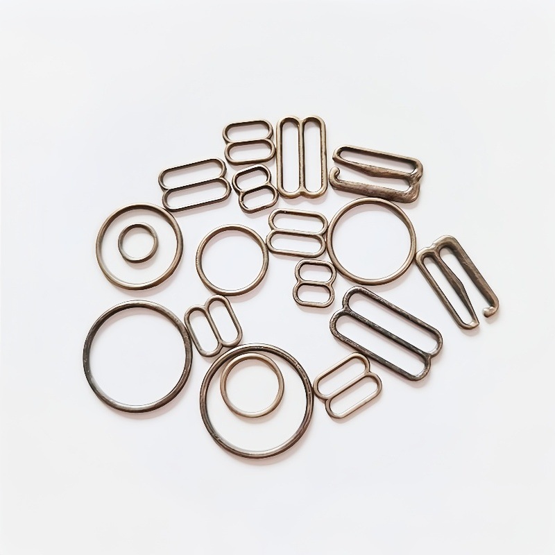 Botón de ropa interior de metal en stock, aleación de zinc de plástico, sujetador redondo en forma de octeto y nueve, botón de ajuste de cintura de hombro.