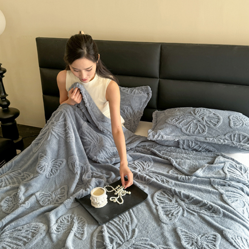 Torre de viento de lujo ligero transfronterizo Fufu terciopelo color sólido jacquard multifunción manta manta manta de sofá de mariposa jacquard de una sola capa manta al por mayor