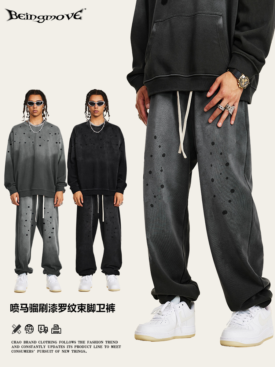 Otoño y invierno de 2025 marca de moda retro agua lavado pantalones de pintura hombre pantalones casuales de correa sueltos pantalones deportivos