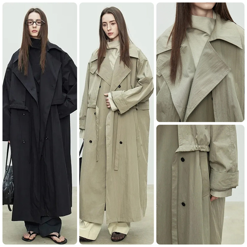 Gray-green loose-fitting long trench coat for women, with large lapel, double-breasted, dropped shoulders, wide sleeves, and over-the-knee length