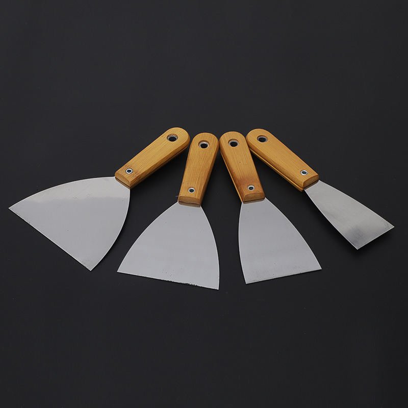 Cuchillo de cenizas de aceite de acero inoxidable al por mayor, mango de madera de dos colores, espátula multifuncional, espátula de limpieza de decoración de percusión gruesa