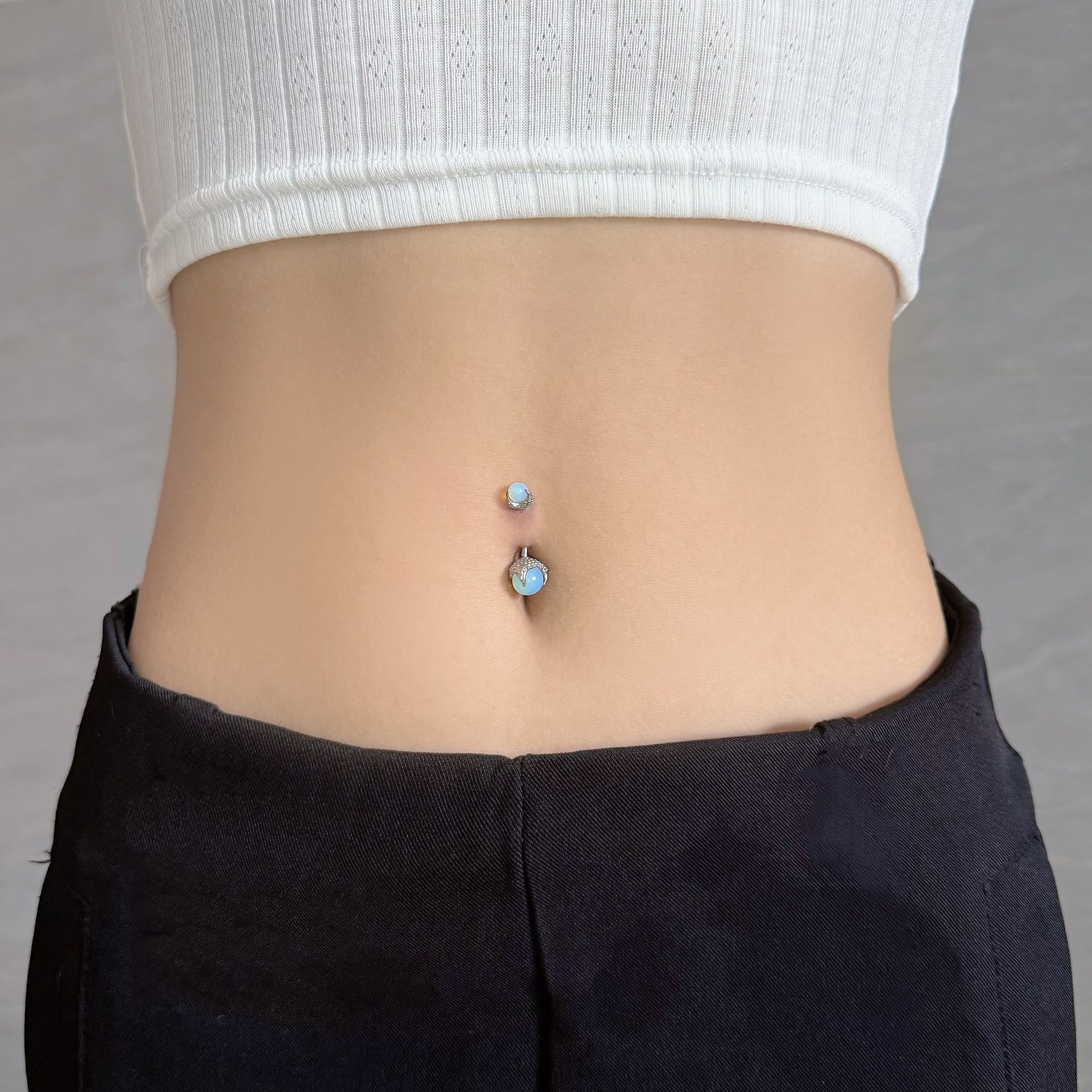 Silver pointed spike labret stud material detail