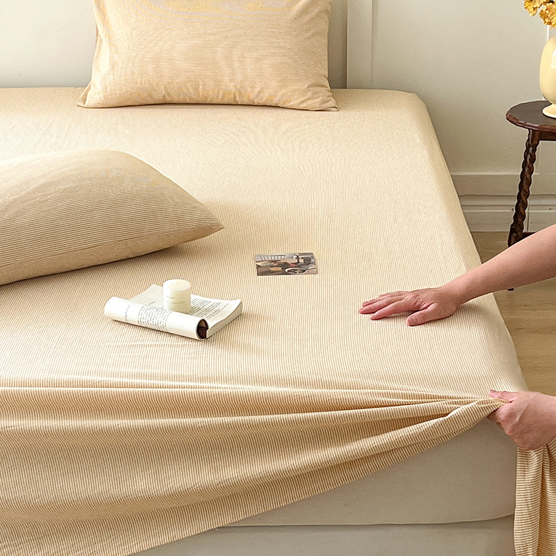 Nueva sábana de algodón puro sábana de algodón funda de cama de una pieza protectora de colchón cama de dormitorio antideslizante juego de tres piezas 1,5 metros