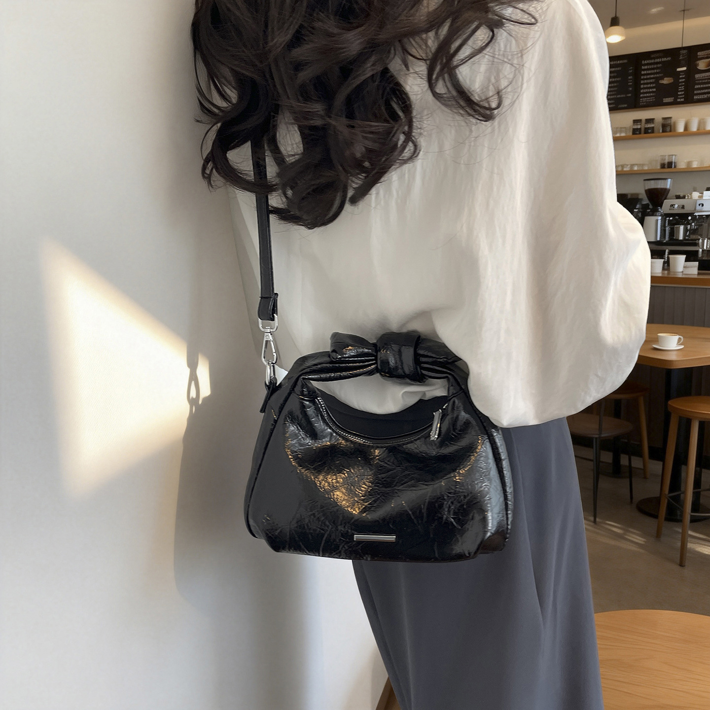 Bolsa de mano de arco para mujeres 2026 nuevo bolso de hombro de moda de verano super caliente sensación diaria mochila de viaje