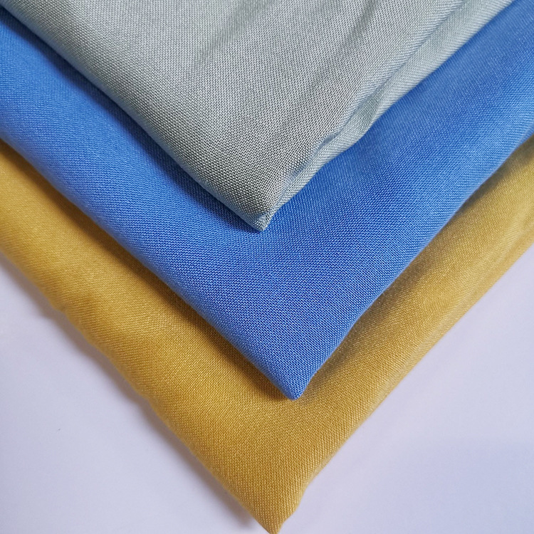 Fabricante de suministro de color plano inelasticado primavera viscose rayon camisa de verano tela tejida
