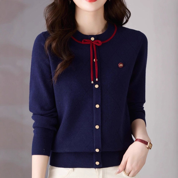 Autumn knitted cardigan with a round collar