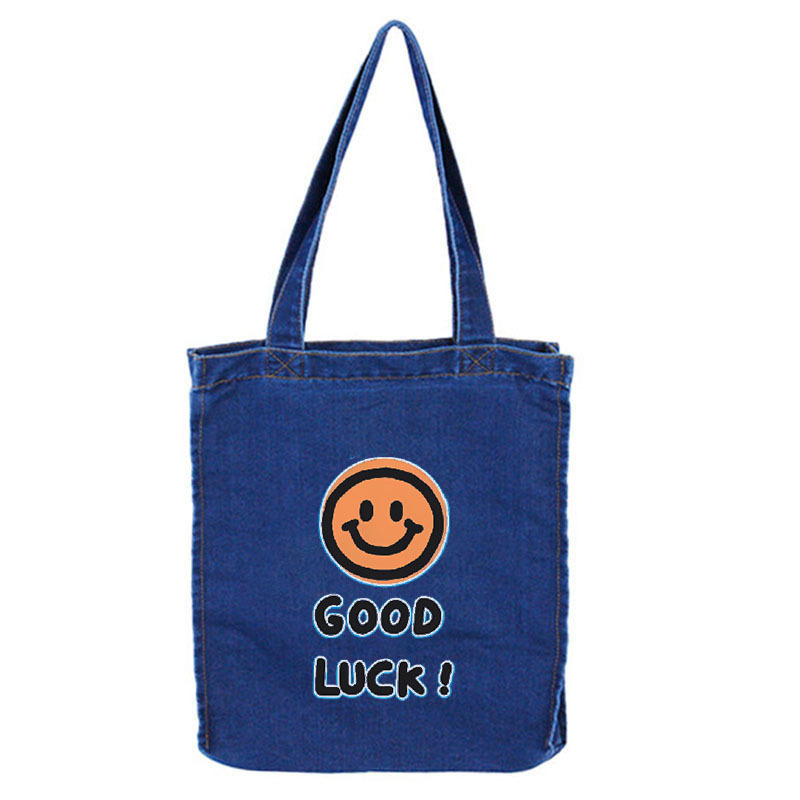 Venta al por mayor de bolsos de hombro único versión coreana de bolsos de lona impresos con letras simples de estilo literario y artístico bolsos de lona de moda y respetuosos con el medio ambiente bolsos de lona portátiles