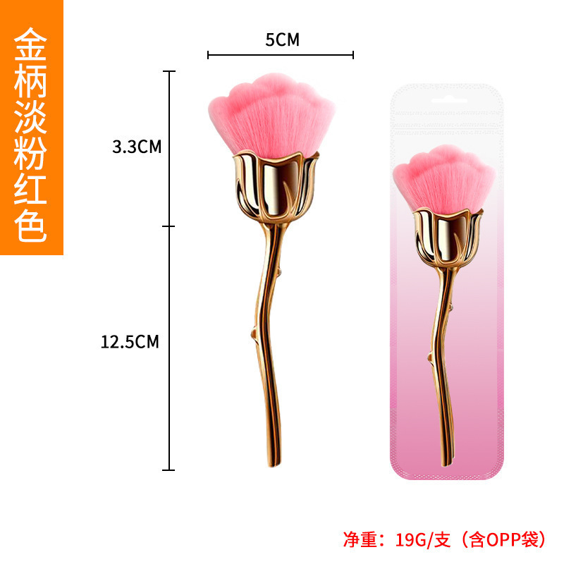 バラのばらの粉の化粧ブラシの化粧道具の爪の粉のほこりは頬紅のブラシを塗って化粧道具の現物を修理します。|undefined