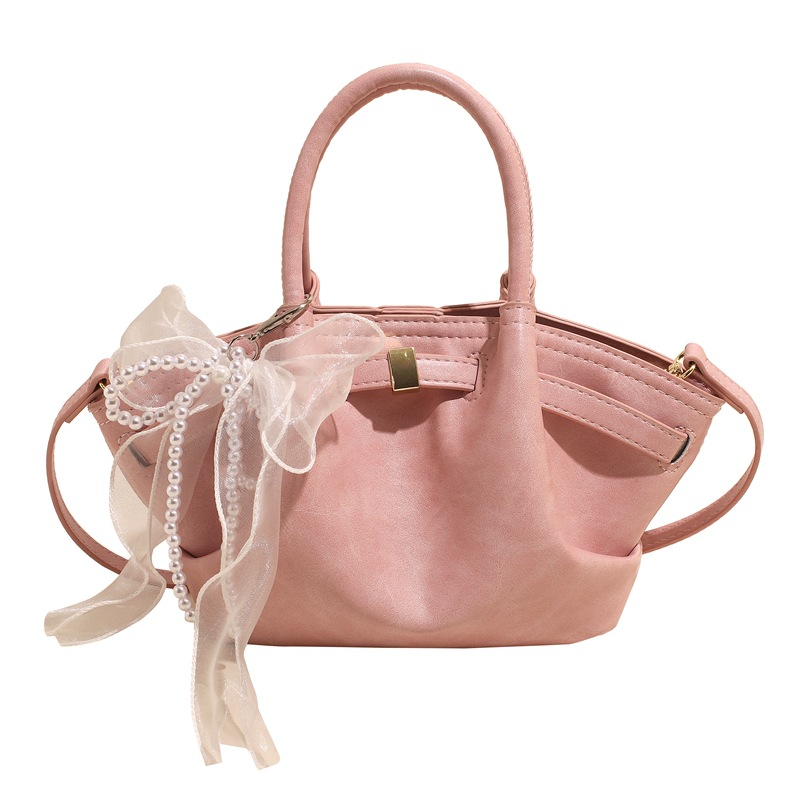 Nicho Zhong bolso de pulsera de brazalete para mujeres 2025, nuevo tipo de mochila de viaje, diseño de tendencia, bolso de cubo de alta calidad