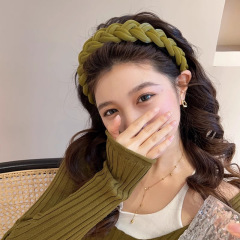 韓国版pu皮新作編み麻花カチューシャ女性ファッション百合気質シンプル滑り止め延長ヘッドトップカチューシャ