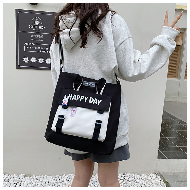 Large-capacity file bag, primary school student handbag that can be carried on one shoulder, book bag for girls with high appearance standards, homework books and test papers bag details Picture