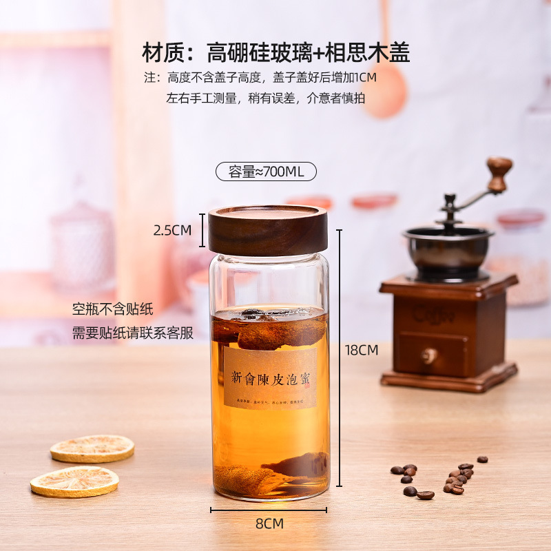 蜂蜜を入れて瓶を分けて専用の食品級の高ホウ素シリコンを詰めて缶を密封します。|undefined