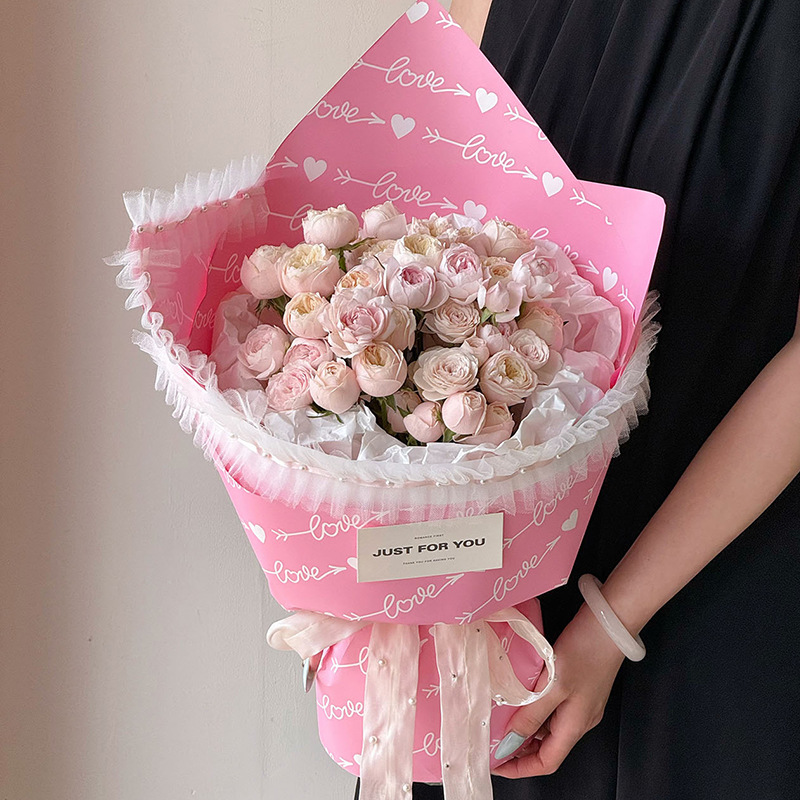 Huaxi estrella de poliéster de color flor empaque de flores de bordes siete días de San Valentín ramo DiDi florista flor empaque de flores de tela