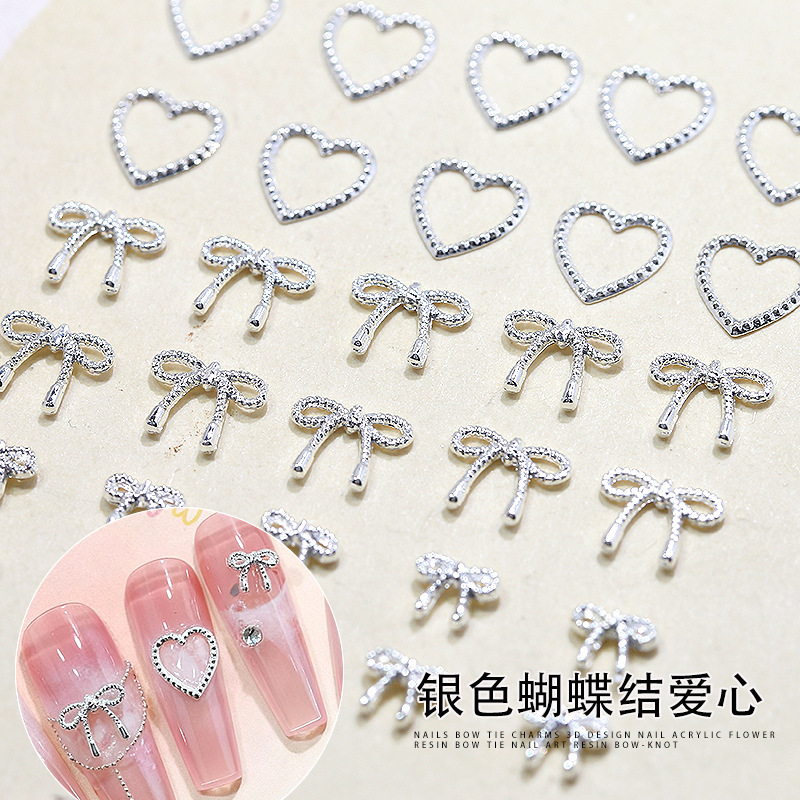 Silver Bow Jewelry, Manicure Accessories, Hollow Heart Metal Alloy, Wearable Nail Decoration, Nail Diamond Jewelry Wholesale Silver Bow Jewelry, Manicure Accessories, Hollow Heart Metal Alloy, Wearable Nail Decoration, Nail Diamond Jewelry Wholesale