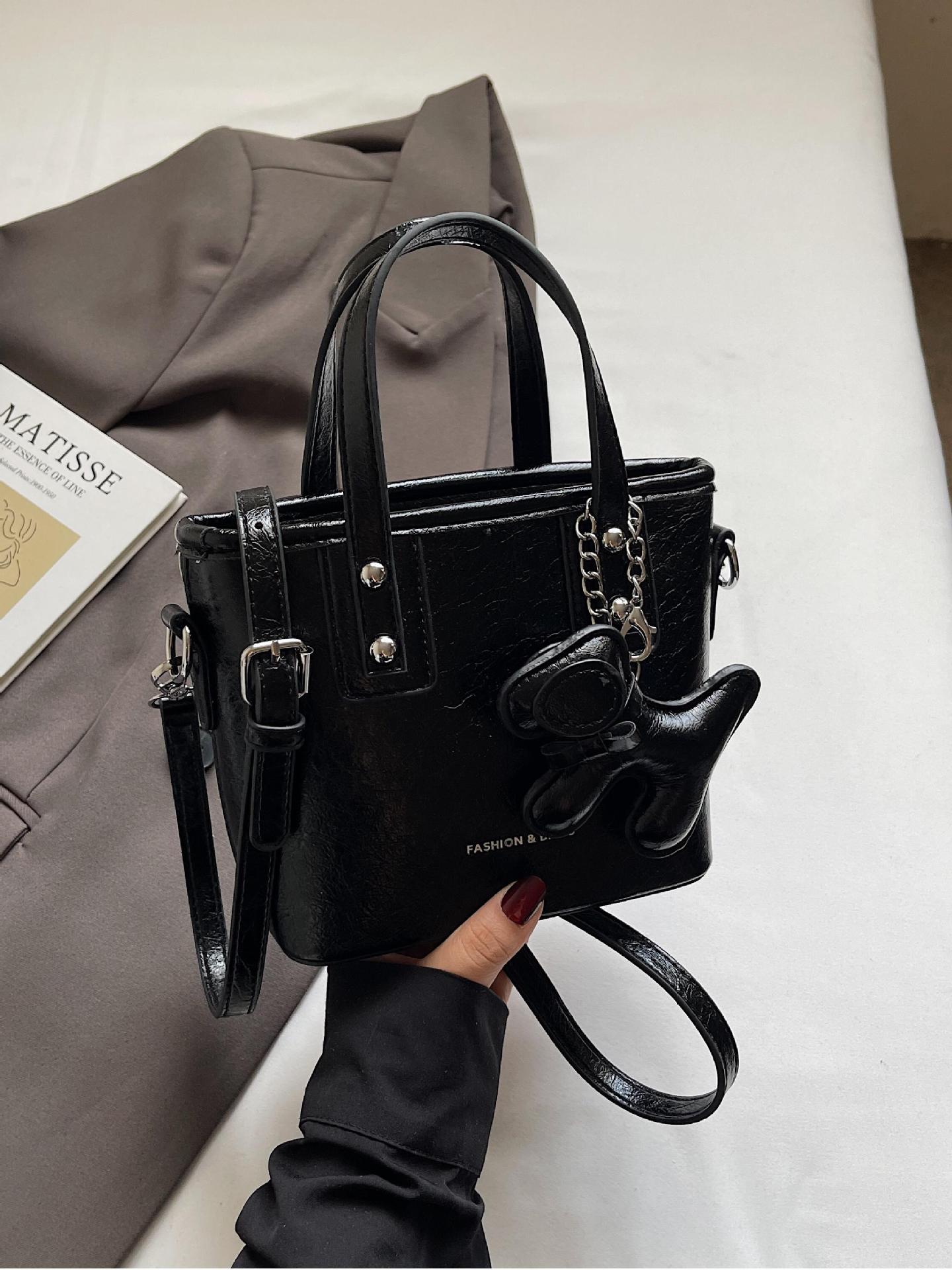 Bolso popular de este año para mujeres 2025, nuevo paquete de cubo de textura transfronteriza de alta calidad, moda versátil bolso de mochila superfuego