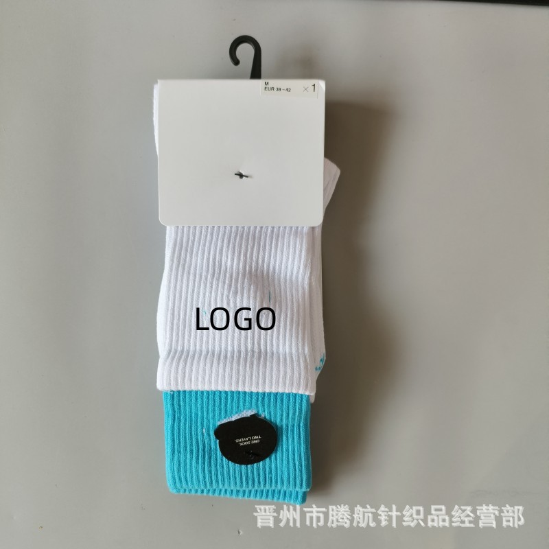 蘇万ナイキの靴下のカラーの二重は男女の中で長い筒のタオルの底のスポーツの靴下をつなぎ合わせてバスケットボールの靴下を走ります。