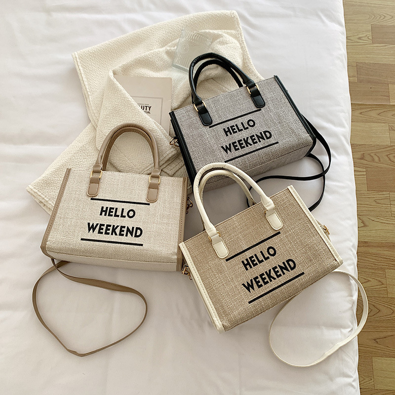 Simple retro lienzo de moda de hombro bolsa de mano para mujeres 2022 nueva moda casual bolso de mano ligero de gran capacidad