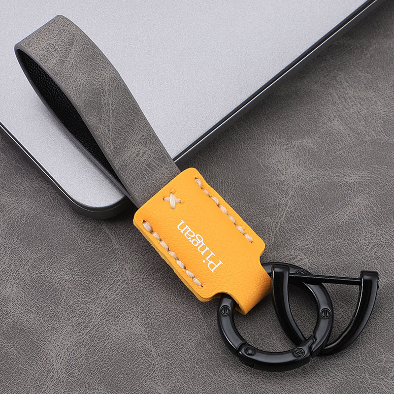 Llavero de coche con hebilla D para coche, llavero de cuero con cuerda de mano, colgante de llave de negocio simple personalizado, colgante multicolor