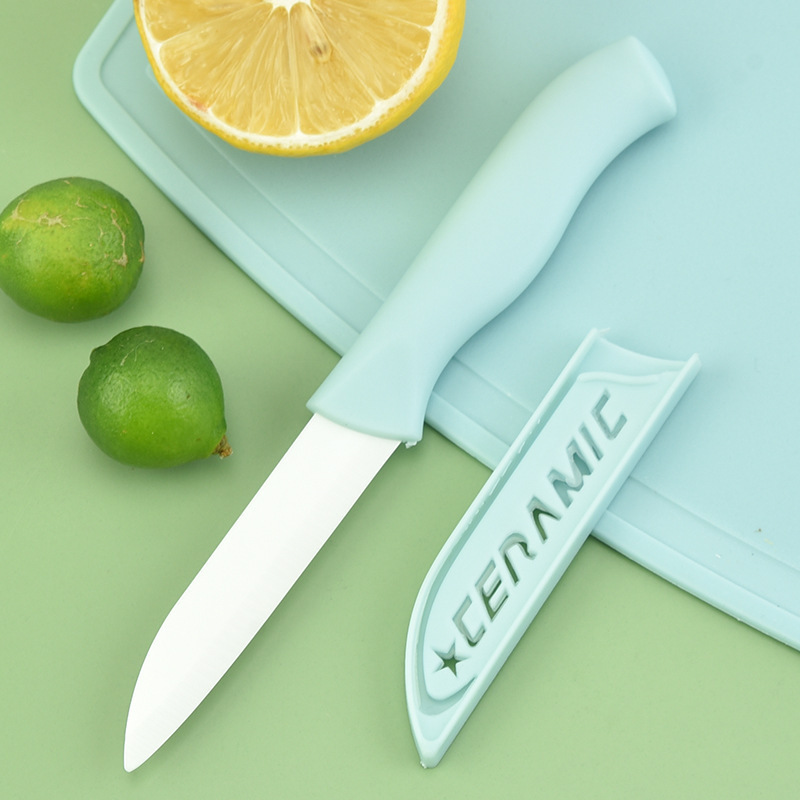 Suplemento de alimentos para bebés traje de fruta cuchillo de cerámica de tres piezas tabla de cortar melón Cepilladora cuchillo combinación de doble cara tarjeta de color de embalaje