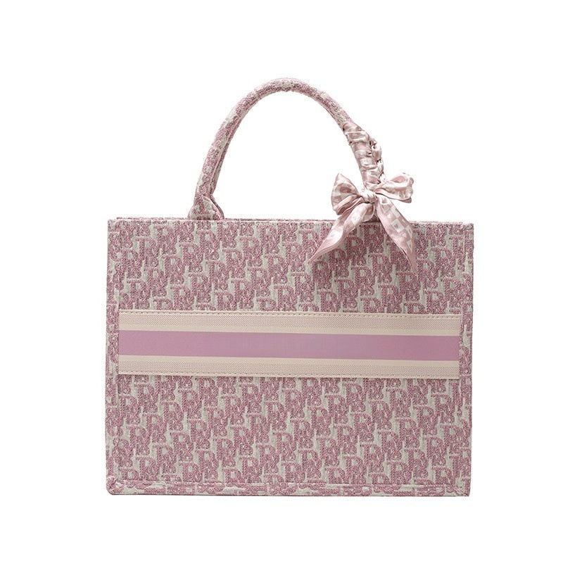 Bolsos bordados de alta calidad para mujeres 2026 nuevas letras de tela transfronterizas retro bolsas de mano de transporte de gran capacidad