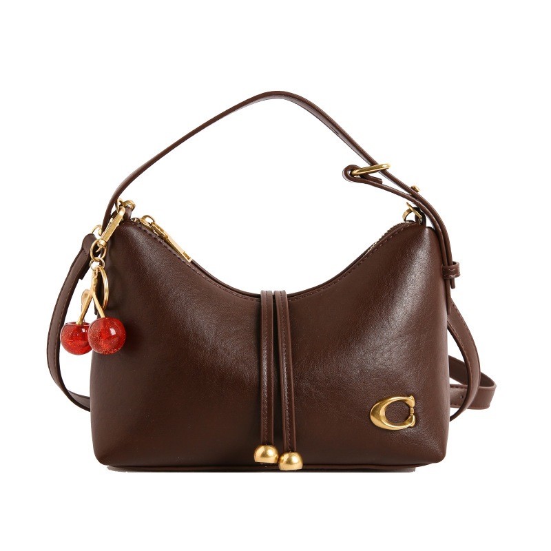 Bolso de mujer de moda de verano bolso de mano popular nicho coreano lujo ligero universal de alta calidad de viaje de hombro mochila
