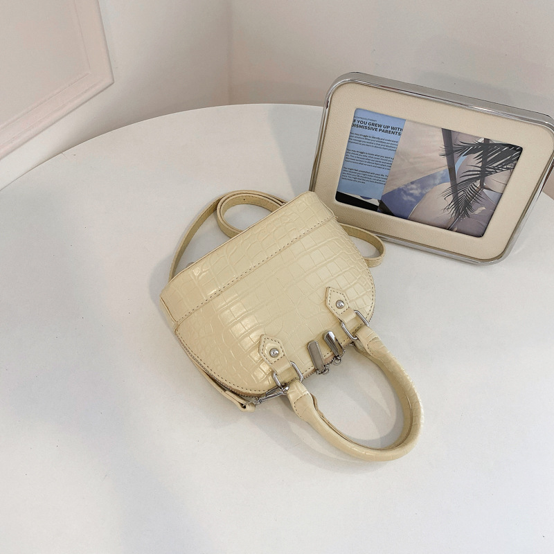 Verano estampado de piedra sensación diaria bolso de mano para mujeres 2026 nueva moda viaje bolsa de hombro bolsa de concha de tramo inclinado