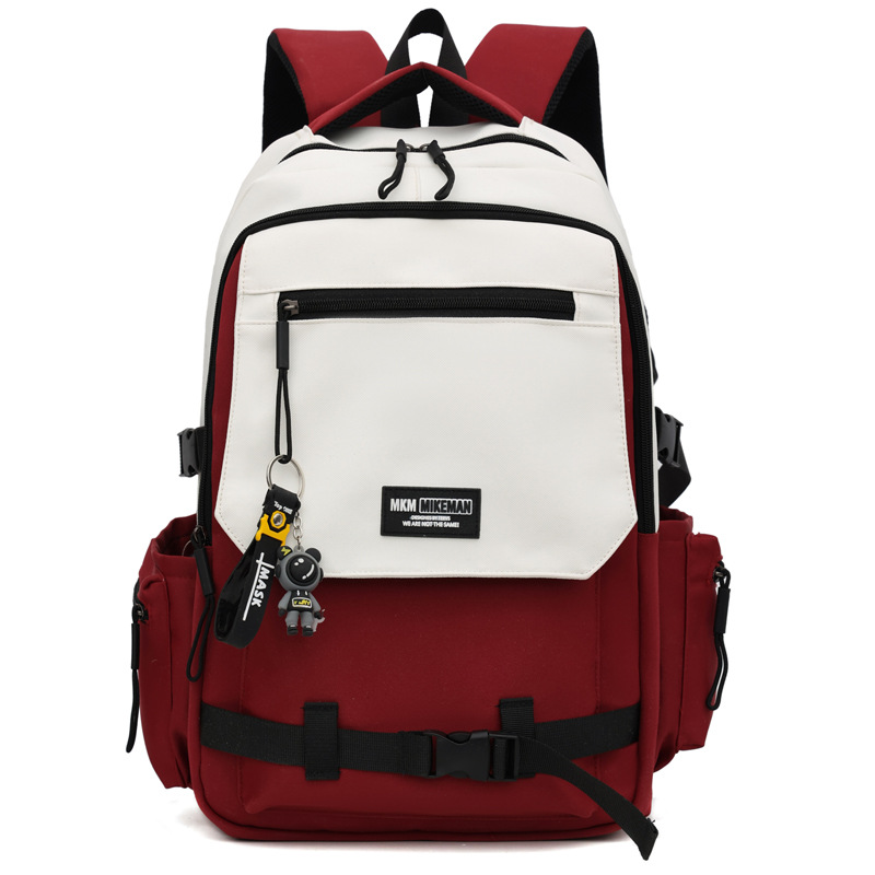 La nueva mochila de la marca de moda para hombres y mujeres de gran capacidad mochila de viaje ligera al aire libre para estudiantes de secundaria y secundaria.