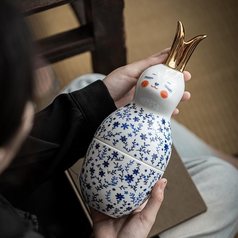 Creativo francés floral conejo té tarro con la selección de té de cerámica dibujo de oro conejo decoración sellada empresa regalo de vacaciones