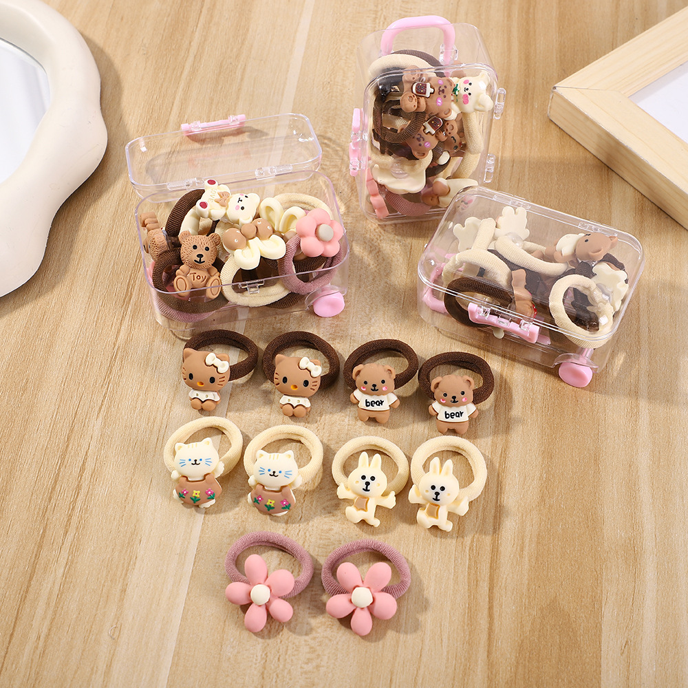 Una pequeña caja de tracción de café de leche para niños cuerdas de cabello correa no daña el cabello de las niñas lindas toallas anillo de venta transfronteriza caliente