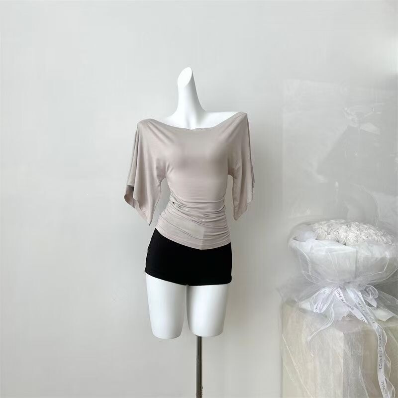 Qiao'er offers a stylish and elegant one-shoulder T-shirt with high elasticity and a slim fit, in a milk tea color, featuring knitted bell sleeves. Direct sales and drop shipping available Qiao'er offers a stylish and elegant one-shoulder T-shirt with high elasticity and a slim fit, in a milk tea color, featuring knitted bell sleeves. Direct sales and drop shipping available