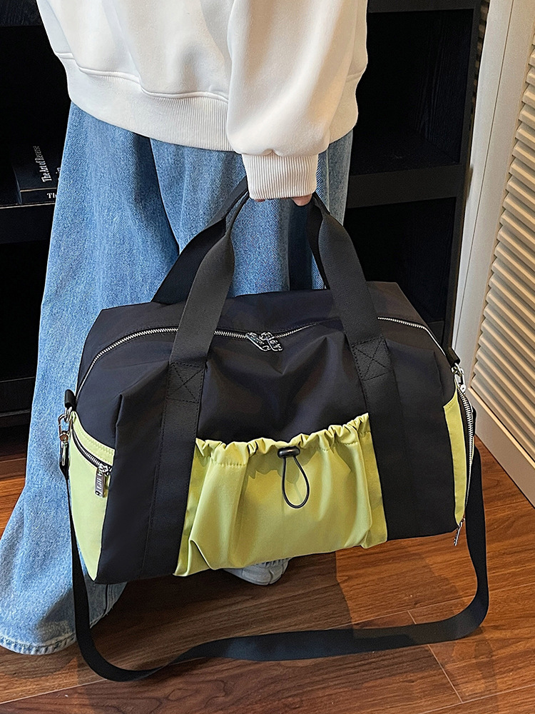 Bolsas deportivas de gran capacidad de ocio, bolsas de viaje de hombro simples de moda para mujeres, bolsas de mano ligeras de tirado.