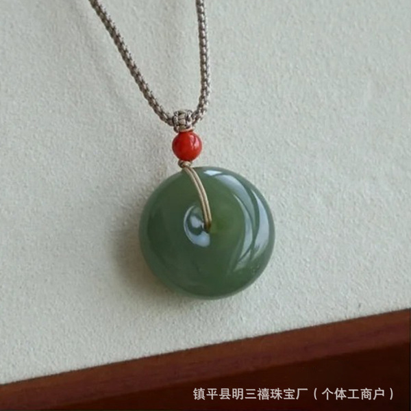 Protective amulet from Khotan district white jade