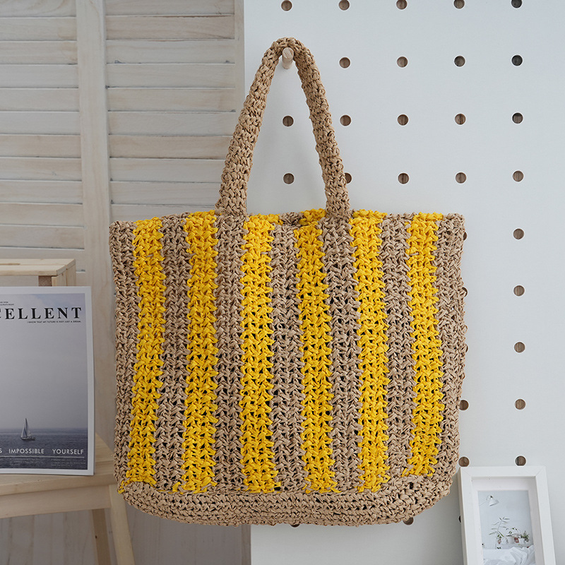 Nueva playa tejida bolsa de viaje de las niñas bolso de mano retro portátil bolsa de paja de gran capacidad bolso de hombro a rayas