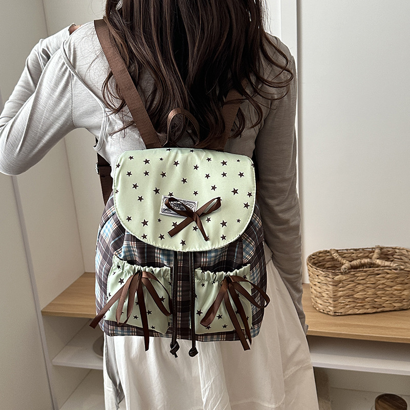2026 nuevo tipo de bolso de cubierta casual de tendencia universal mochila nicho Volkswagen gran capacidad de bolso de mujer ligero mochila coreana mujer