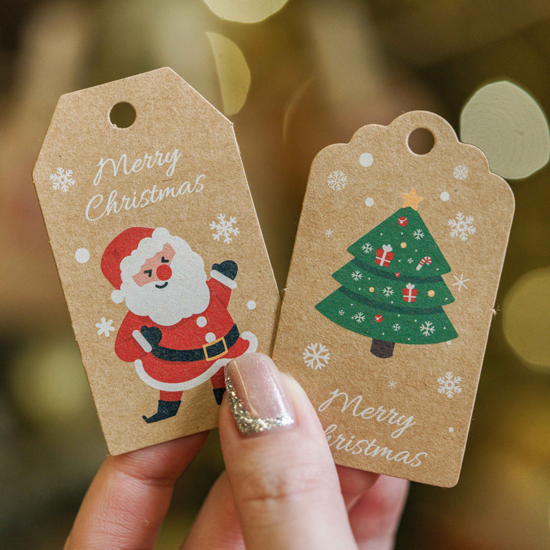 現物アマゾンのクリスマス装飾タグを厚くして、サンタクロースのクリスマスプレゼント装飾カードを印刷します。|undefined