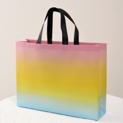 Laser coated clothing gift packaging bags, multi-color non-woven bags, advertising shopping handbags with logo printing
