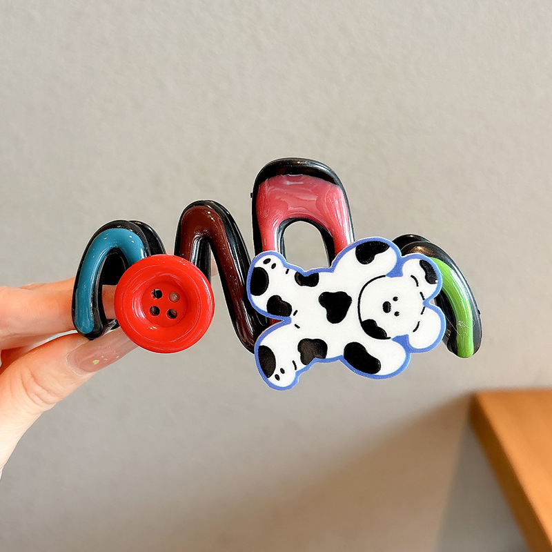 1#Pinza para cachorros con botón 10,5cm