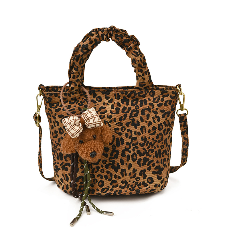 Moda leopardo bolso de niña lindo perro colgante mochila de niño otoño y invierno nuevo bolso de niños de peluche