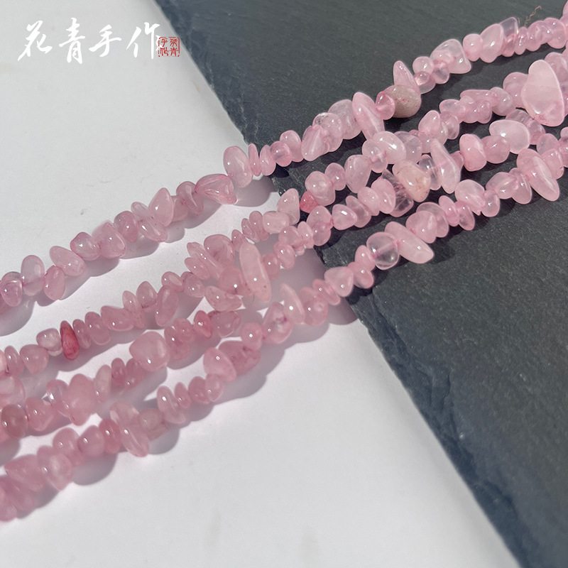 Optimized deep rose quartz strand, approximately 80cm