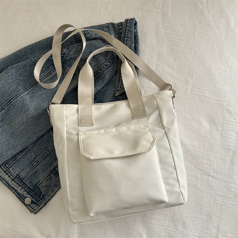 Corea del estilo de transporte universal lona multi-bolsillo TOT estudiantes de arte ocio simple 2025 bolso de hombro portátil